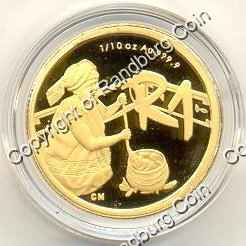 SA_Gold_Cultural_4_BOB_WM/2009_Gold_One_Tenth_Cultural_Bapedi_Coin_rev