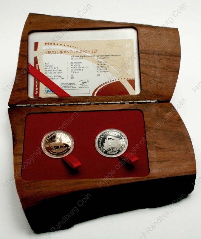 SA_Gold_KR_Proof_4_BOB_WM/2009_Gold_KR_1_oz_Launch_Mintmark_Set_with_Silver_Com_Medallion_Box_open_rev