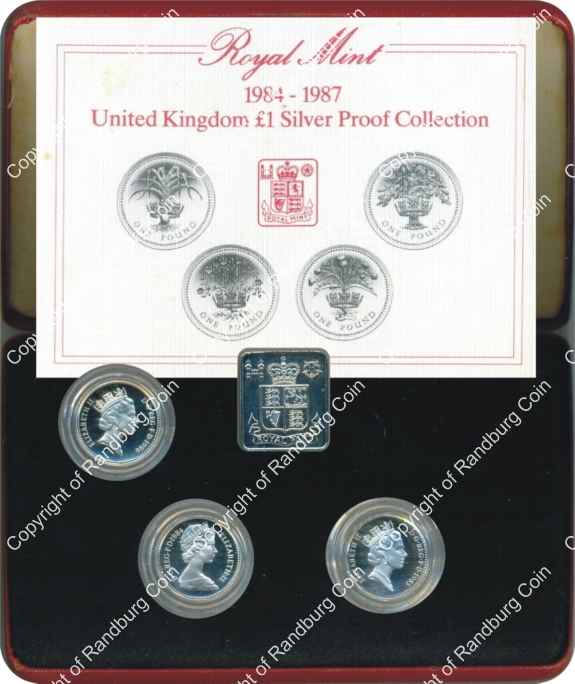 Great_Britain_1987_4-coin_Silver_Proof_1_pound_set_missing_coin_box_ob.jpg