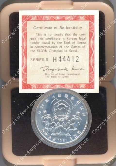 Korea_1987_Olympics_Kicking_Silver_5000_Won_Box_ob.jpg
