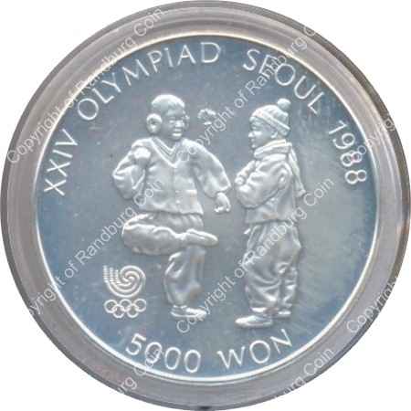 Korea_1987_Olympics_Kicking_Silver_5000_Won_rev.jpg