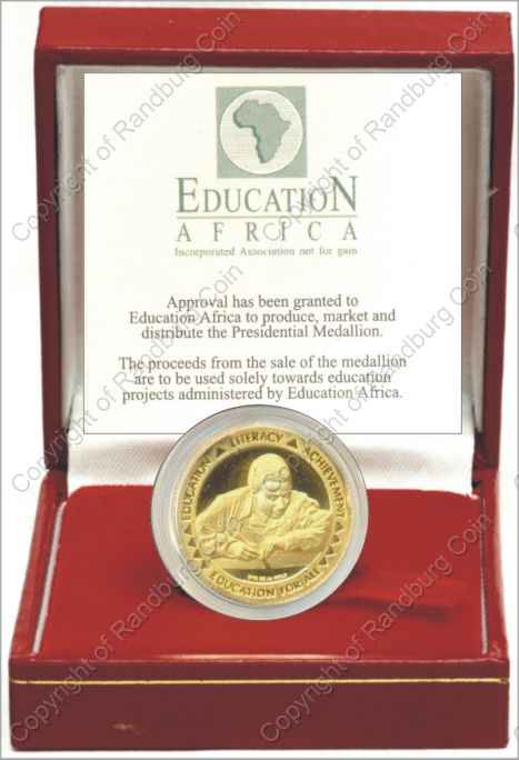 Mandela_FNB_Medallion_Tenthoz_Gold_Education_box_rev.jpg