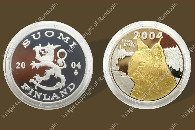 2004_Gold_Natura_Launch_Set_Caracal_Fin_Medallion_ob_and_rev